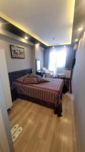 Postel nebo postele na pokoji v ubytování MEHMET BEY HOTEL