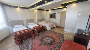 Postel nebo postele na pokoji v ubytování MEHMET BEY HOTEL