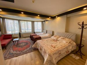 Postel nebo postele na pokoji v ubytování MEHMET BEY HOTEL