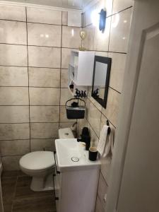 Kúpeľňa v ubytovaní ila’s tiny house + 21 fotografií