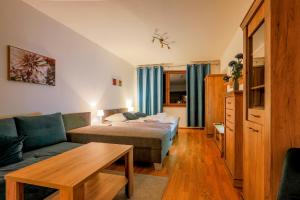 Llit o llits en una habitació de Apartmánový dom Fatrapark 1 s Wellness - Hlavná recepcia