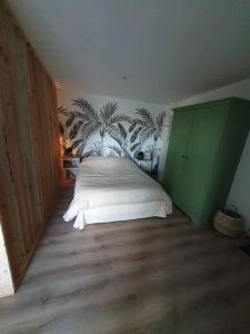 Katil atau katil-katil dalam bilik di Charmant appartement au calme