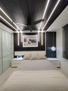 Posteľ alebo postele v izbe v ubytovaní Bungalows del Golf Almerimar