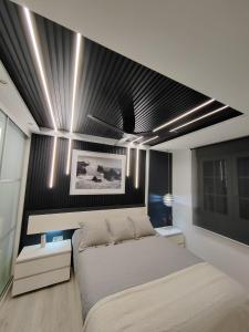 Posteľ alebo postele v izbe v ubytovaní Bungalows del Golf Almerimar