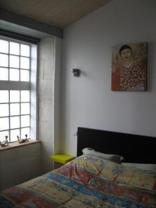 Posteľ alebo postele v izbe v ubytovaní Maison de ville et cabane de plage
