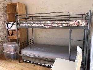 Poschodová posteľ alebo postele v izbe v ubytovaní Maison de ville et cabane de plage
