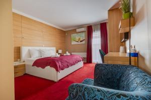 Cama ou camas em um quarto em Hotel Sky