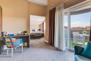 Cama ou camas em um quarto em Hotel Sky