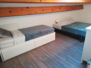 Postel nebo postele na pokoji v ubytování Le Clos de la Foret - proche plage