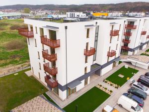 an overhead view of a white building with balconies at Apartament Marbud 2 przy Aquaparku Reda in Rumia