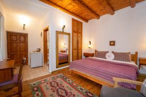 Кровать или кровати в номере Watermill Villa & Hotel Faralya