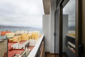 a view from the balcony of a building at Estudio con vistas al mar en Las Canteras in Las Palmas de Gran Canaria