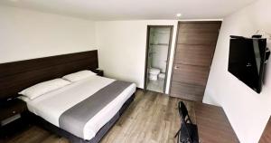 TV a/nebo společenská místnost v ubytování Hotel Expo Hotel Ferial + 26 fotografií