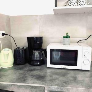 O bucătărie sau chicinetă la Jolie appartement 2 chambres 65m2 au centre ville