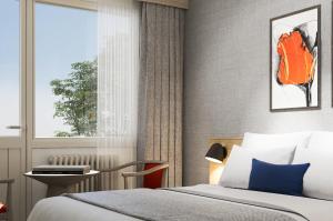 a bedroom with a bed and a window at Erzurumlu Hotel in Kilyos +23 photos