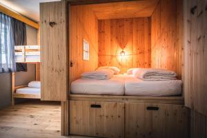 Posteľ alebo postele v izbe v ubytovaní Tauernlust Outdoor & Relax