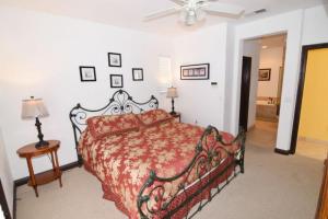 a bedroom with a bed and a ceiling fan at Condo 19-3 Family Vacation Condo on the Sea of Cortez pools tennis and golf in Playa El Paraíso +21 photos