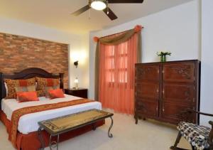 Postel nebo postele na pokoji v ubytování Hotel Dorado Plaza Boutique Calle del Arsenal
