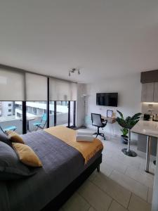 Postel nebo postele na pokoji v ubytování Apartamentos Bauerle Curitiba