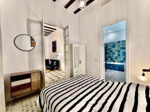 Posteľ alebo postele v izbe v ubytovaní Picasso's Deluxe Puerta Verde + 6 fotografií