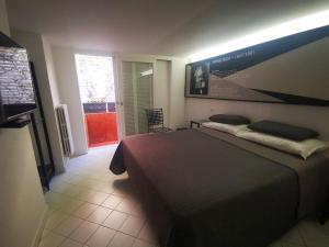 Postel nebo postele na pokoji v ubytování Muta House