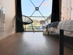 Posteľ alebo postele v izbe v ubytovaní L'îlot - Cosy moderne avec parking
