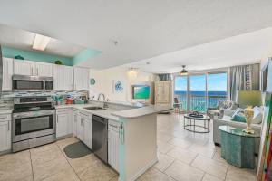 a large kitchen with a view of the ocean at Pelican Beach Resort Rentals in Destin
