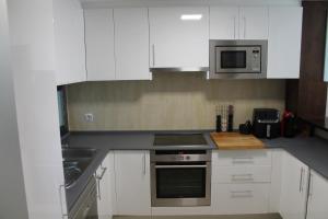Kuchyňa alebo kuchynka v ubytovaní APARTAMENTO LA CALA DE MIJAS VITANIA COSTA DEL SoL