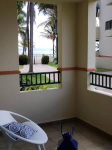 Uma varanda ou terraço em 1st Level Unit Steps to Beach- Cold Air Conditioner at Poza del Mar Luquillo