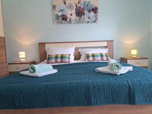 Posteľ alebo postele v izbe v ubytovaní Apartment Penić