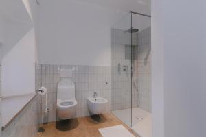 Koupelna v ubytování PIRA HOTEL