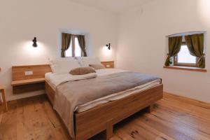 Postel nebo postele na pokoji v ubytování PIRA HOTEL