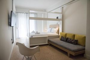 Postel nebo postele na pokoji v ubytování Syntagma View Apartment