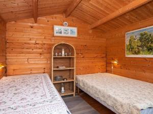 Postel nebo postele na pokoji v ubytování Holiday home Knebel LXI