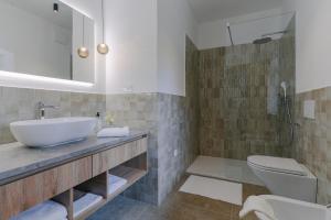 Koupelna v ubytování PIRA HOTEL