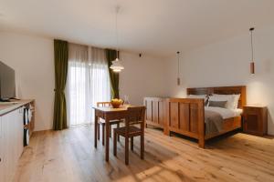 Postel nebo postele na pokoji v ubytování PIRA HOTEL