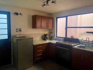 Kuchyň nebo kuchyňský kout v ubytování Suites Incoreli, Departamento 4