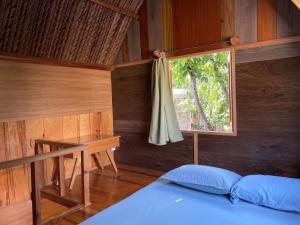 Đà Lạt Củi Homestay客房内的一张或多张床位