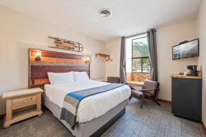 Letto o letti in una camera di Hotel Leavenworth