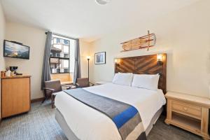 Letto o letti in una camera di Hotel Leavenworth