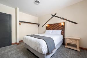 Letto o letti in una camera di Hotel Leavenworth