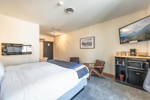 Letto o letti in una camera di Hotel Leavenworth