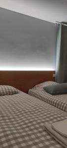 Cama ou camas em um quarto em Ponta Delgada Apartment T3