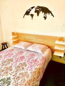 Postel nebo postele na pokoji v ubytování Le tout à pied!
