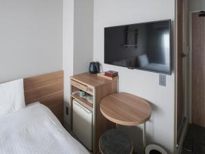 东京浅草筑波快速船舶酒店(Vessel Inn Asakusa Tsukuba Express)房間的床