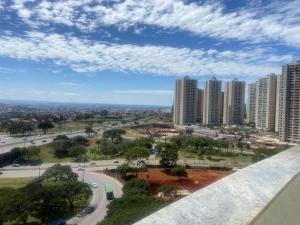 a view of a city with tall buildings at Hotel Taguatinga Flat - conforto e requinte - Apto 416 in Brasilia