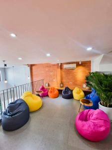 a room with colorful bean bags in a room at Lemon House in Quy Nhon