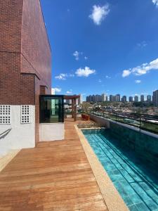 Πισίνα στο ή κοντά στο Flat charmoso Jardim Botanico