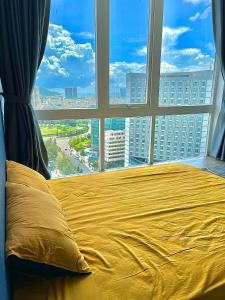 Giường trong phòng chung tại Nice OSC 'Apartment 807