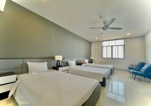 Katil atau katil-katil dalam bilik di My Khe 2 Da Nang Seafront Hotel